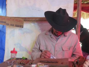 Local tobacco farmer teaches us how to make a cigar (and smoke it).