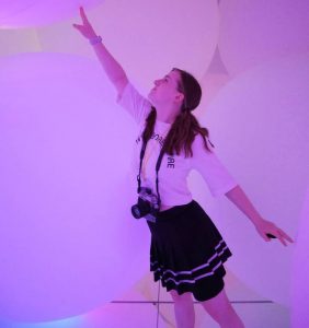 Striking a pose in one of the rooms at TeamLab. This room was filled with large balloon like balls which changed colour.
