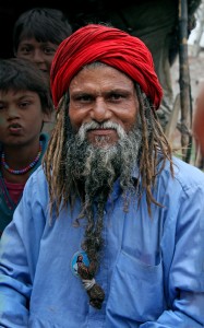 A village elder.  He has tied a picture of a local 'pir' (saint) onto the end of his beard. 