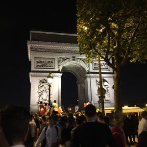 Supporters celebrating France's World Cup semi-final win down the Champs-Élysées 