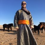 Wearing traditional Mongolian dress