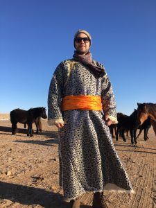 Wearing traditional Mongolian dress