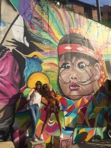 me and my friend Clara were visiting comuna 13 to do a tour of the graffiti