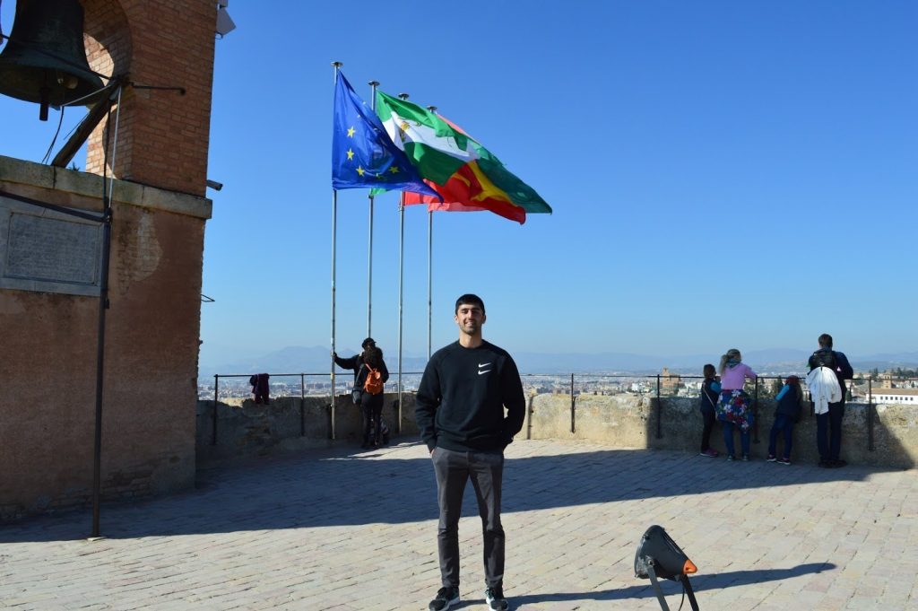 At the top of the tower next to the Alhambra