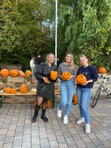 Me and my housemates Paula and Nicel with our pumpkins