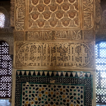 Arabic writing cover the walls